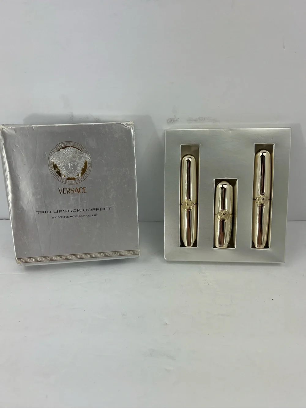 VERSACE TRÍO VINTAGE LIPSTICKS COFFRET SET WITH MEDUSA LOGO, IN GOLD COLOR